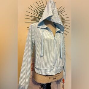 NWT Colsie size Small in an ice blue velour feel and two pockets on the side.